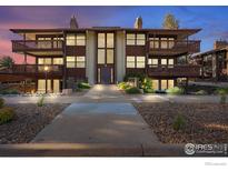 Stunning condo building with multiple levels of private balconies and beautiful landscaping at 500 Manhattan Dr # A9, Boulder, CO 80303