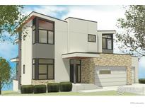 Modern two-story home boasts stone accents, large windows, and a convenient two-car garage at 2313 Glacier Ct, Lafayette, CO 80026