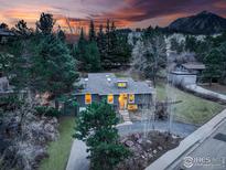 Charming home with landscaped yard, mountain view and beautiful sunset at 1880 Kohler Dr, Boulder, CO 80305