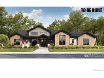 Stunning to-be-built home featuring mixed materials and a well-manicured lawn at 1061 Berthoud Peak Dr, Berthoud, CO 80513
