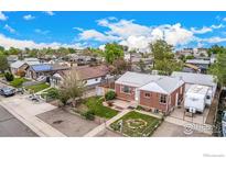 Charming brick home with a well-maintained front yard and ample street parking in a quiet neighborhood at 8110 Ivy St, Commerce City, CO 80022