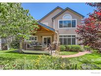 This home has a spacious deck and landscaped backyard, perfect for outdoor entertaining and relaxation at 1069 Monarch Way, Superior, CO 80027