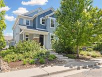 Charming two-story home with manicured landscaping and a welcoming front entrance, located at 2830 Skyview Lane at 2830 Cascade Creek Dr, Lafayette, CO 80026