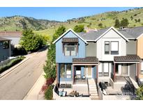 Charming townhome with mountain views, a cozy front patio, and stylish architectural details at 5315 5Th St # A, Boulder, CO 80304