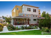 Attractive modern home with a welcoming front porch and well-maintained landscaping at 1231 Cedar Ave, Boulder, CO 80304