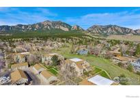 Beautiful aerial view of a community with mountain views and lush green spaces at 3381 Cripple Creek Trl # D14, Boulder, CO 80305