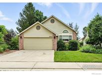 Charming single-Gathering home featuring a two-car garage and a well-manicured lawn at 7196 Christopher Ct, Niwot, CO 80503