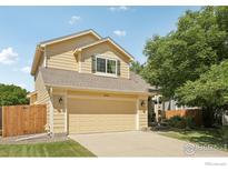 Charming two-story home with a two-car garage and well-maintained lawn at 2608 E 132Nd Ave, Thornton, CO 80241