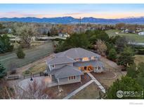 Stunning home exterior featuring beautiful architecture and breathtaking mountain views at 2527 Columbine Cir, Lafayette, CO 80026