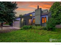 Charming home exterior showcasing unique architecture and manicured lawn at 3470 16Th St, Boulder, CO 80304
