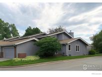 Charming single-story home with a well-manicured lawn and inviting curb appeal at 3119 Westwood Ct, Boulder, CO 80304