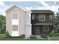 Striking new home exterior showcasing a modern two-tone design with stone and siding details at 1442 Coral Pl, Longmont, CO 80504