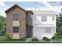 Charming two-story home featuring a stone facade, complemented by neutral siding and well-manicured landscaping at 1446 Coral Pl, Longmont, CO 80504