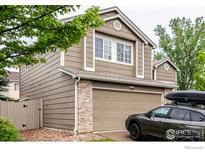 Charming two-story home featuring a two-car garage and neutral siding at 3101 Goldeneye Pl, Superior, CO 80027