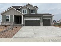 Charming two-story home with a spacious three-car garage and well-maintained landscaping at 1783 Jennifer St, Brighton, CO 80601