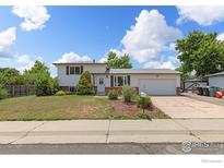 Charming two-story home with a well-manicured lawn and inviting curb appeal at 3792 E 114Th Dr, Thornton, CO 80233