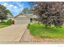 Charming single-Gathering home featuring an attached two car garage and well-maintained lawn at 5493 Bobcat St, Frederick, CO 80504