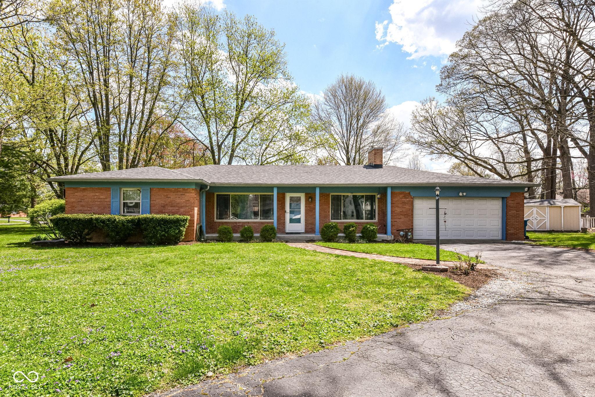 Photo one of 1101 Oakwood Trl Indianapolis IN 46260 | MLS 22034805