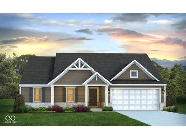 Charming single-story home with attractive architectural detailing, two-car garage, and landscaped front yard at 238 Chadford Ct, Indianapolis, IN 46229