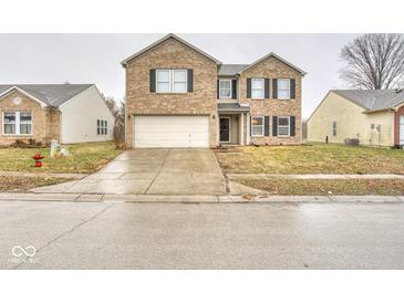 Charming two-story brick home with black shutters and attached two-car garage at 2225 Shadowbrook Dr, Plainfield, IN 46168
