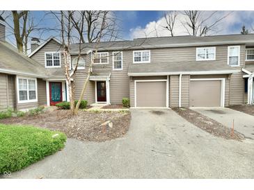 Charming townhome with attached garages and driveway at 7854 Harbour Isle, Indianapolis, IN 46240