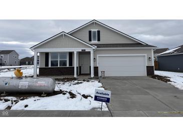 New construction home with gray siding and a two-car garage at 5226 Woodhurst Ln, Indianapolis, IN 46239