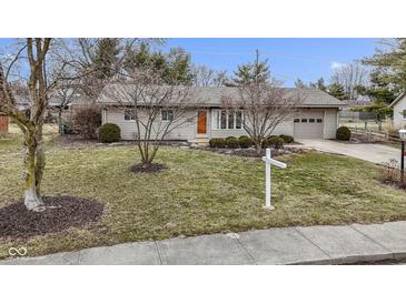 Charming home featuring a well-maintained front yard and a cozy, inviting facade at 1024 N Michigan St, Greenfield, IN 46140