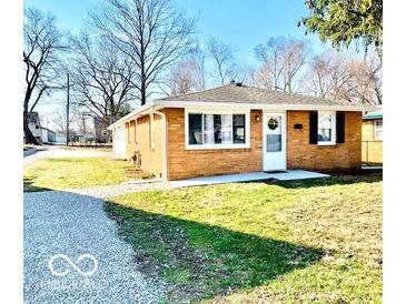 Charming single-story brick home with a well-maintained lawn and inviting front entrance at 2245 Wallace Ave, Columbus, IN 47201