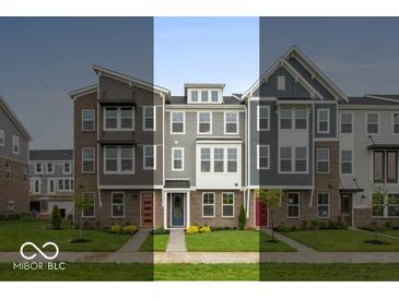 Charming townhomes with colorful doors and well-maintained lawns in a friendly neighborhood setting at 7340 W County Road 600 Rd, McCordsville, IN 46055
