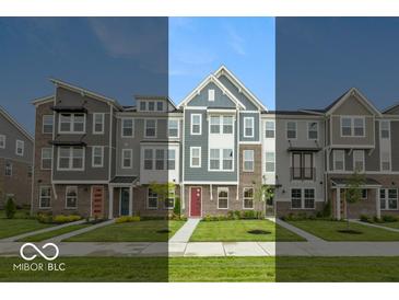 Attractive townhomes featuring varied facades, professionally landscaped lawns and welcoming entrance doors at 7344 W County Road 600, McCordsville, IN 46055