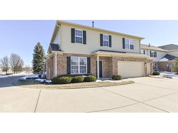 Charming two-story home with a brick facade and an attached garage at 4007 Bullfinch Way, Westfield, IN 46062