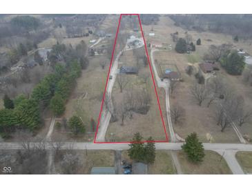 Aerial view of a property with a large plot of land, showing home and surrounding area at 11197 N Gasburg Rd, Mooresville, IN 46158
