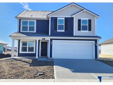 Charming two-story home featuring navy blue siding, white trim, and a spacious two-car garage at 3191 W Keepsake Ln, Monrovia, IN 46157