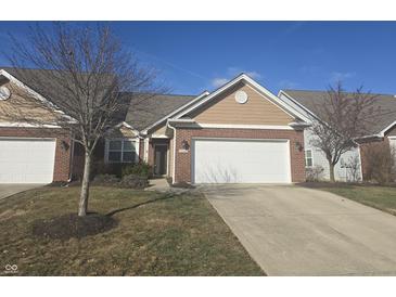 Brick front ranch home with attached garage and landscaping at 3538 Heathcliff Ct, Westfield, IN 46074