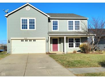 Two-story house featuring a neutral color scheme and a two-car garage at 9486 W Midnight Dr, Pendleton, IN 46064