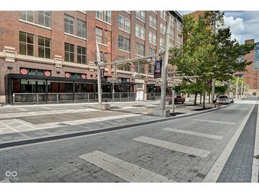 Brick building exterior with a plaza and street view at 141 S Meridian St # 605, Indianapolis, IN 46225