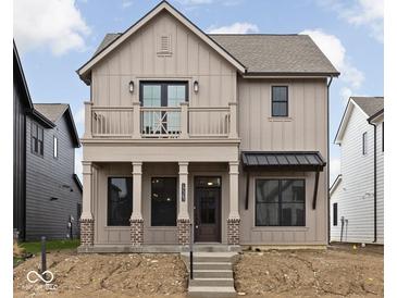 Charming two-story home featuring a balcony and covered porch, blending classic and modern design at 17363 Newton Main St, Westfield, IN 46074