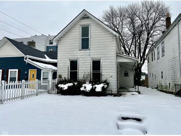 White house exterior in snowy front yard at 1125 Laurel St, Indianapolis, IN 46203