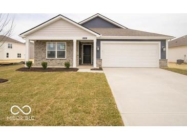 Charming single-story home with a two-car garage, well-manicured lawn, and attractive curb appeal at 6636 Sulgrove Pl, Indianapolis, IN 46221
