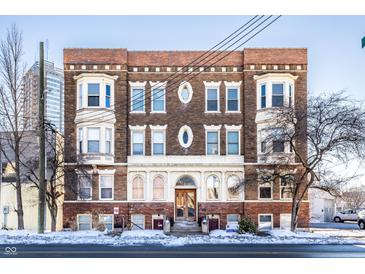 Three-story brick apartment building with ornate detailing at 643 Fort Wayne Ave # H, Indianapolis, IN 46204