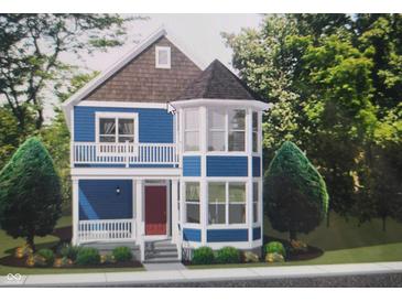 Two-story blue house with wrap-around porch and bay window at 1831 Luther St, Indianapolis, IN 46203