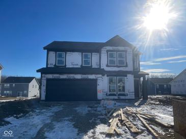 Two-story new construction home with dark gray siding and vinyl windows at 4767 E Shadowbrook Dr, Camby, IN 46113