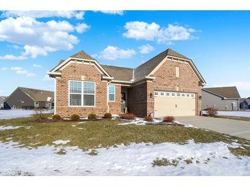 Brick ranch home with attached garage and landscaped lawn at 3844 Albert Ln, Bargersville, IN 46106