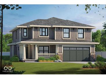 Two-story Craftsman home with gray siding, a large front porch, and a two-car garage at 6020 Birchwood Ave, Indianapolis, IN 46220