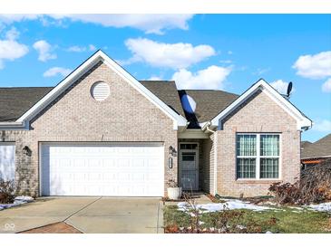 Brick ranch home with attached garage and landscaping at 3893 Kristi Way, Greenwood, IN 46142