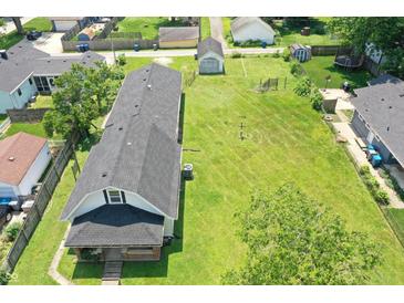 Overhead view of home with large yard and mature trees in a quiet, residential neighborhood at 1175 Central Ave, Noblesville, IN 46060