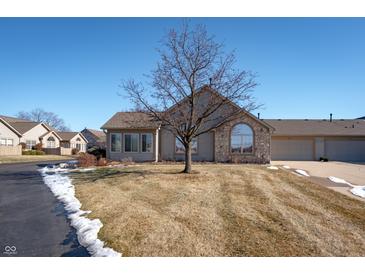 Ranch style home with stone accents and a small front yard at 879 Gazebo Way, Greenwood, IN 46142