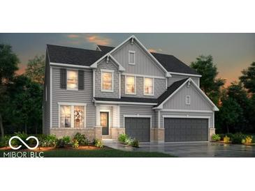 Two-story home with gray siding, stone accents, and a two-car garage at 6403 Rippling Rock Dr, Plainfield, IN 46168