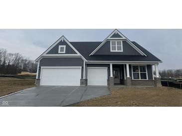 Charming single-Gathering home with a two-car garage, covered entry, and stylish gray siding at 4976 Elaine Ct, Noblesville, IN 46062