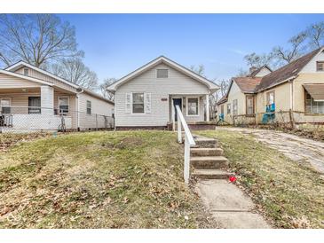 Charming bungalow with steps leading to the front entrance at 2875 Adams St, Indianapolis, IN 46218